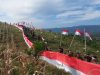 Brimob Parepare dan Brigif 11 Badik Sakti Kibarkan Bendera Merah Putih Panjang 77 Meter di Pegunungan